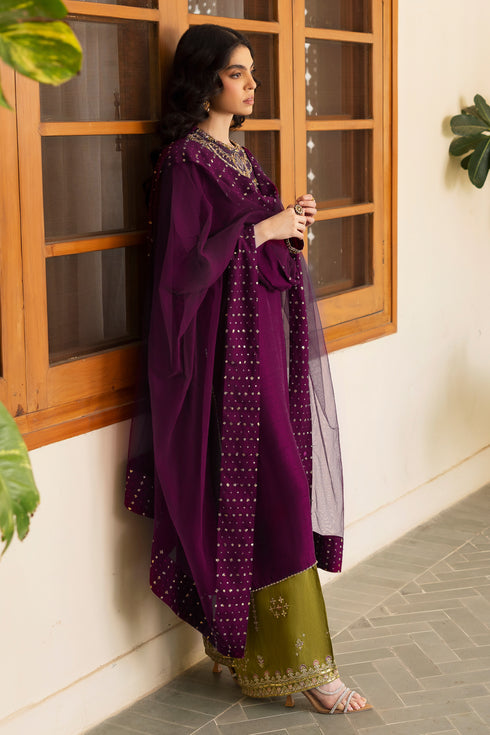 Close-up of NAQSHI Irma olive-green raw-silk culottes featuring thread embroidery, sequin motifs & border detail echoing the shirt’s embellishment style.