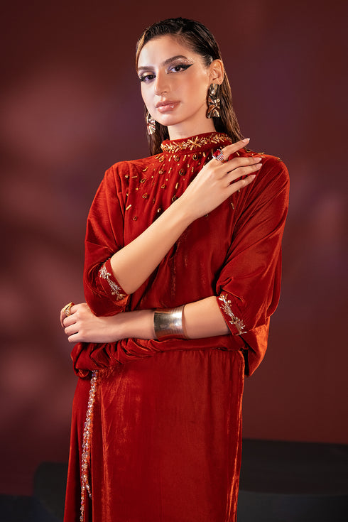 Upper body portrait of Shayna outfit focusing on ban neckline stonework and adda embellishment, elegant ready to wear formal dress.