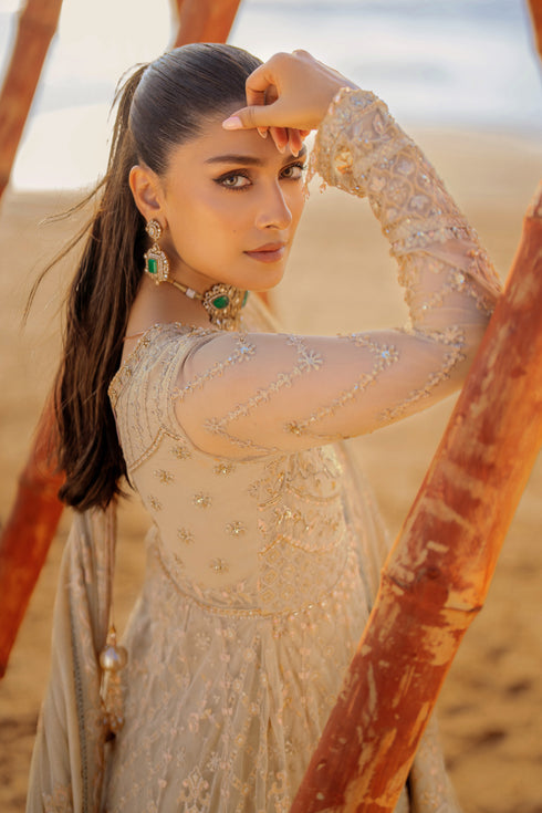 NAQSHI Alara net dupatta draped to showcase Mughal‑inspired floral motif spray, 4‑sided embroidered & sequin border finished with minimal lace.