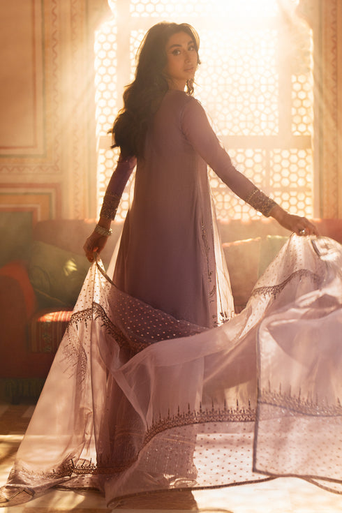 Rear view of lilac A-line organza frock displaying full silhouette and panel structure