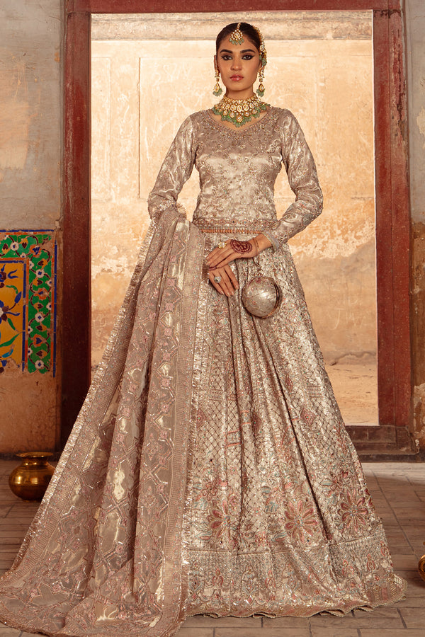 Naqshi Raniya copper-peach pure tissue choli with full sleeve heavily embroidered in zardozi, mirror work, jaal patterns—paired with matching tissue lehenga, embellished pouch & sequined organza dupatta