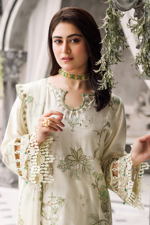 Close view of sleeve embroidery with organza borders and loops detail