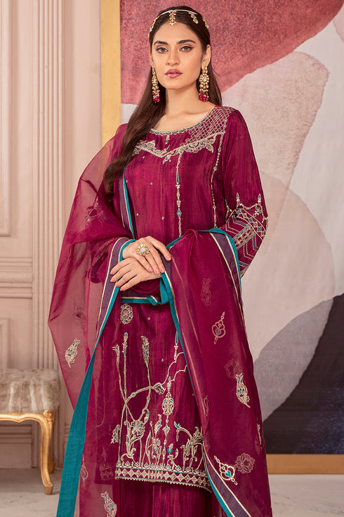 Side styling look of Erina ensemble featuring embroidered sleeves and soft dupatta drape, formal ready made eastern wear.