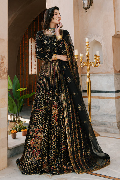 NAQSHI Kaif black Indian raw‑silk lehenga choli with boat neckline, fully hand‑adda embellished choli and heavily jeweled lehenga, styled front on