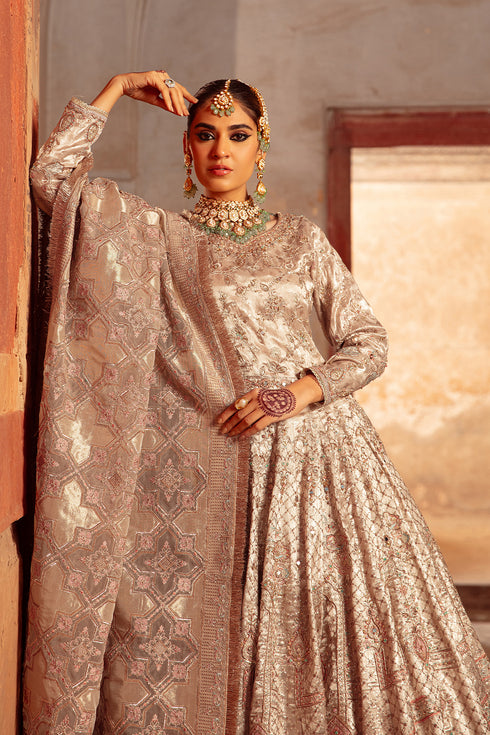 Macro view of Raniya choli front revealing heavy mirror work, zardozi-adda jaal embroidery and wishbone hangings on tissue fabric