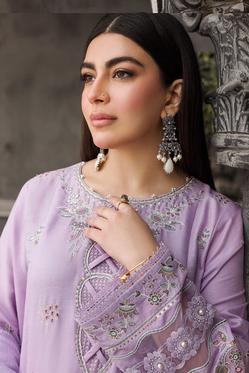 Close-up of NAQSHI Adah neckline showing embroidery, keyhole detail, white thread work, and fine finishing