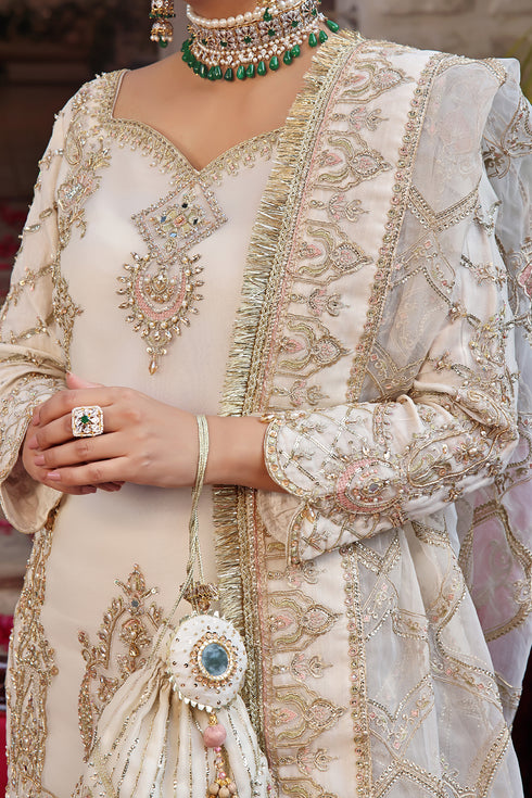 Naqshi Zonar flared gipsy gharara in organza with all-over embroidery, sequin detailing, and scalloped hem trim.