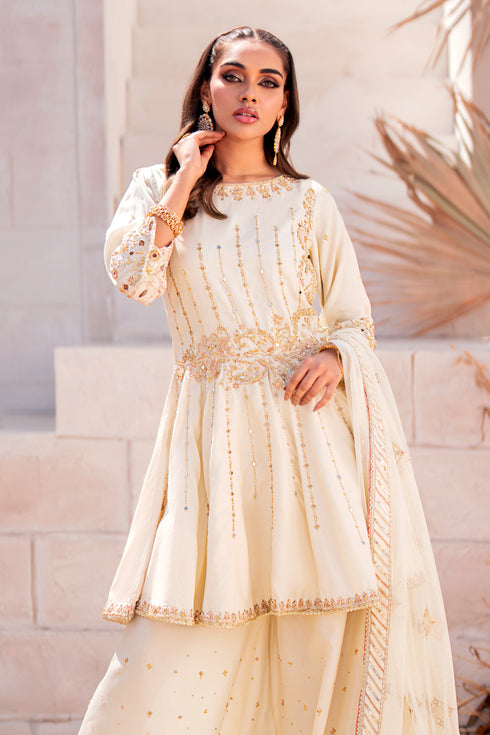 Model wearing Naqshi Diana 3PC set styled elegantly for formal occasions with peplum shirt, sharara & dupatta.