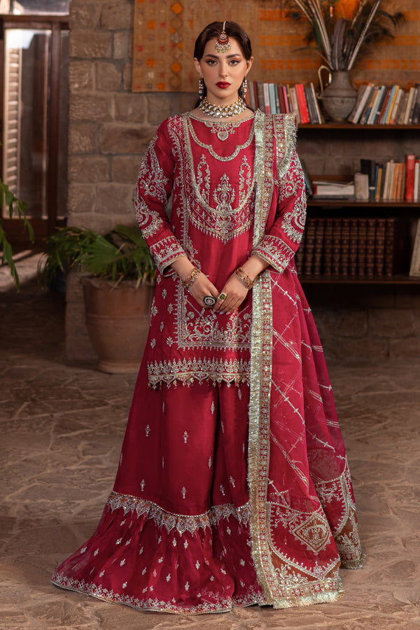 Naqshi nehal ruby‑red organza short shirt heavily hand‑adda embellished with kora, dabka, crystals, sitari & cut‑dana; paired with embroidered gypsy sharara and ornate dupatta.