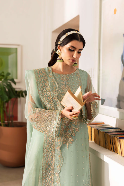 NAQSHI Maiza embroidered organza dupatta draped to display lengthwise scalloped borders and four-sided minimal lace detailing in aqua-blue.