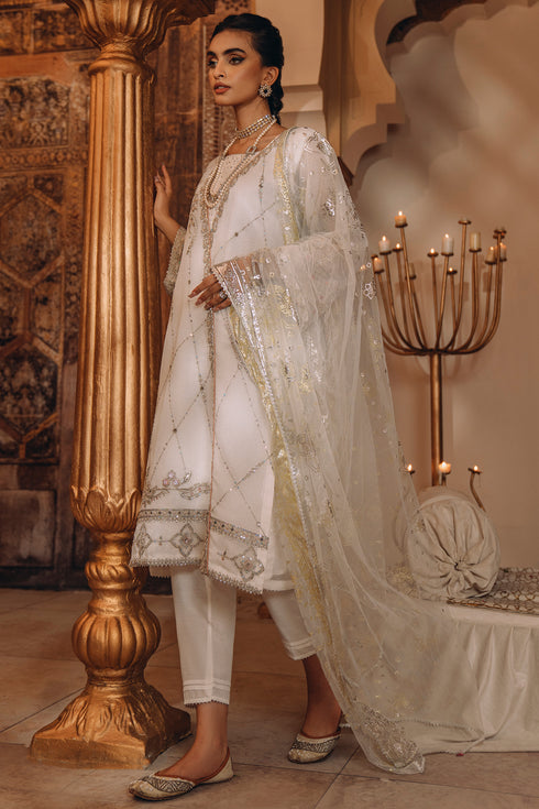 Three-quarter front view of NAQSHI Afrin outfit showing silver embroidery, sequin work, and graceful overall look