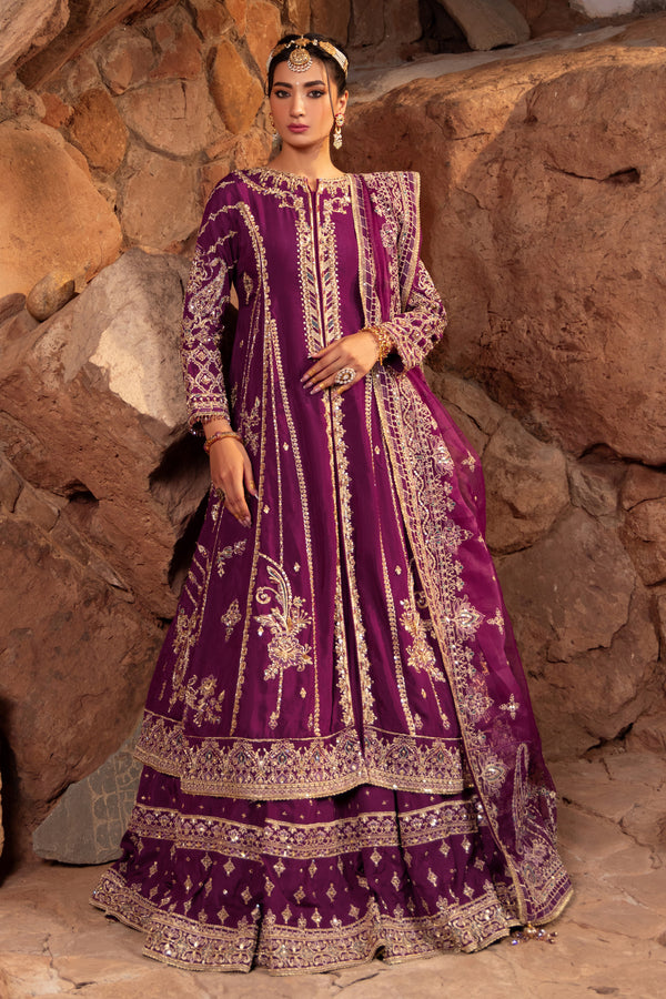 Naqshi Jugnu deep-violet raw-silk front-open frock richly embellished with heavy hand‑adda techniques—kora, dabka, crystals, sitari, cut-dana, tilla, payal, naqshi—over matching lehenga.