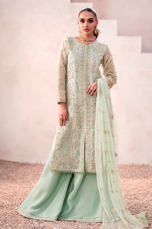 Naqshi Parsa aqua organza long shirt with contrasting pastel hand‑adda embroidery, sequin work, velvet piping at mid slit, paired with embroidered organza sharara and net dupatta.