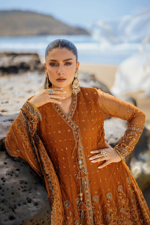 Side view of NAQSHI Tianaa displaying straight angrakha silhouette, mid-patti hand-adda embellishments, contrasting sequin and lace-trim sleeves, and straight silk pants.