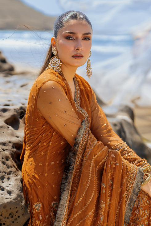 Close-up of NAQSHI Tianaa sleeve cuff showing dense hand-adda embroidery, sequin work, lace edging and signature handmade tassels.