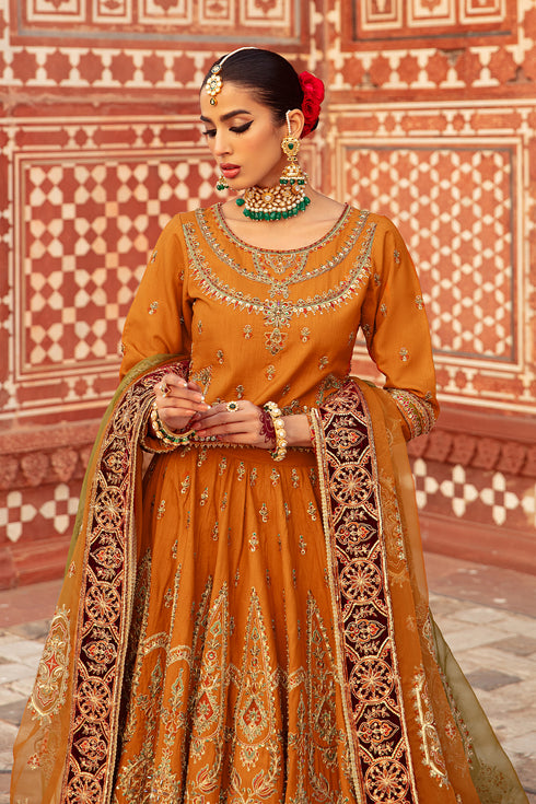 Macro of Zarwisha choli embroidery highlighting tilla, dori‑work and dense embellishments on Indian raw‑silk fabric.