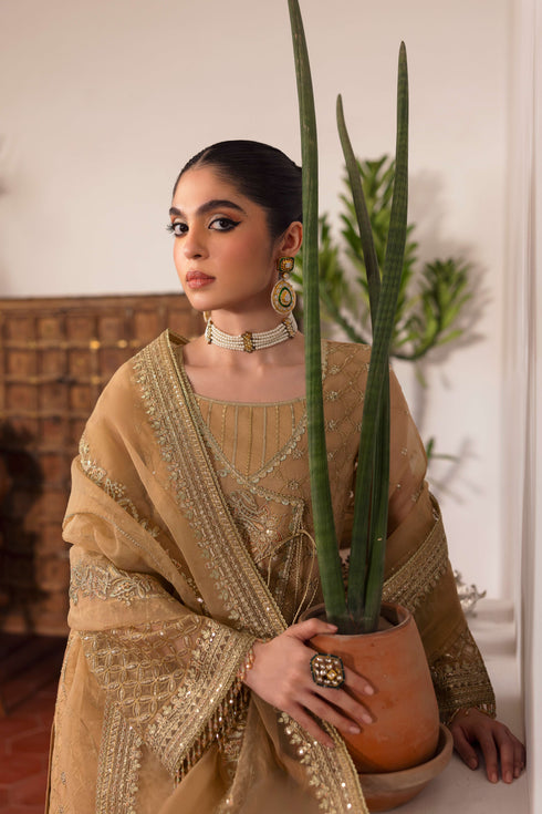 Close-up of NAQSHI Marjaan sleeve cuff emphasizing handmade crystal hangings and dense floral sequined motif on organza.