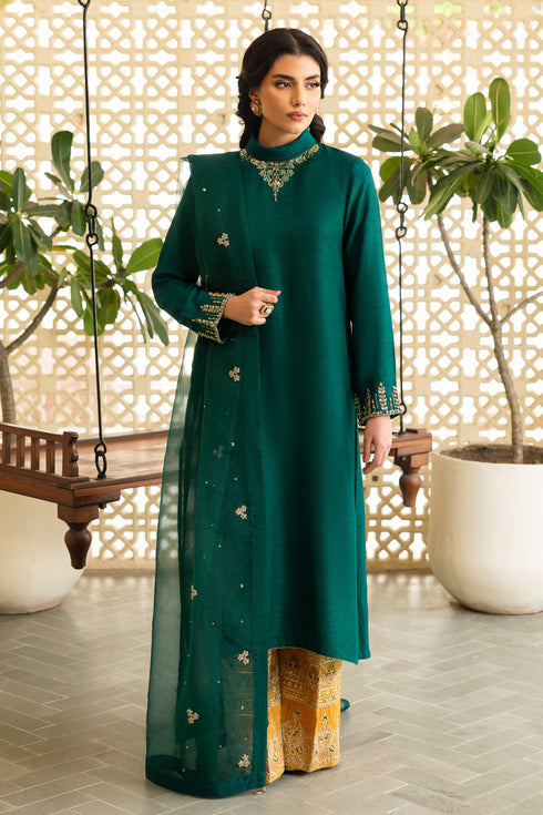 NAQSHI Zauq teal-green raw silk straight shirt with ban neckline richly adorned in hand‑adda techniques—kora, dabka, naqshi, sitara, cut dana, crystals & botanical embroidery; paired with mustard culottes.