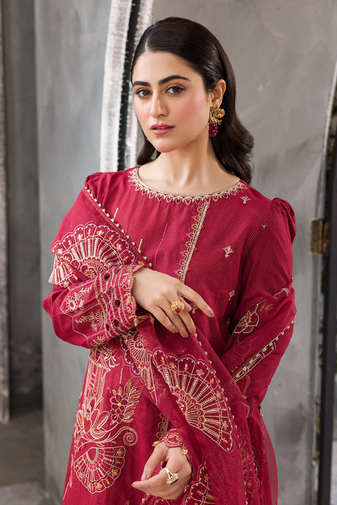 Close portrait view showing Gajra embroidered neckline and puff sleeve detailing