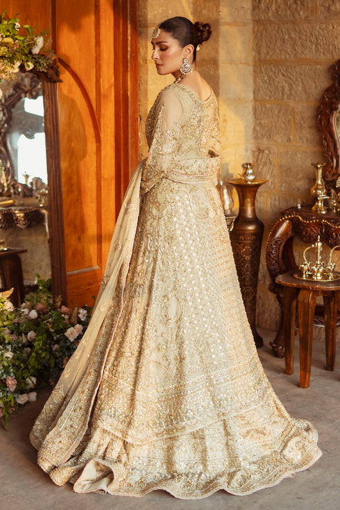 Side view of NAQSHI Roshan Ara showcasing fitted sleeves with crystal hangings, textured net gown silhouette and layered tissue lehenga volume.