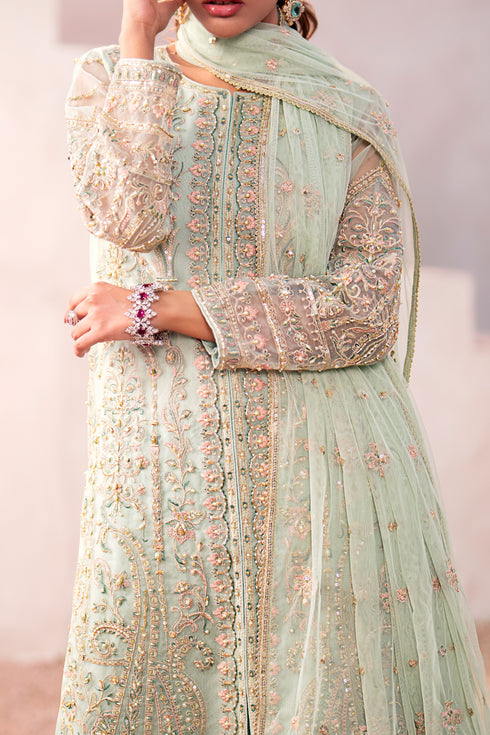Full view of Naqshi Parsa sharara showcasing flowy silhouette and ornate hem detail.