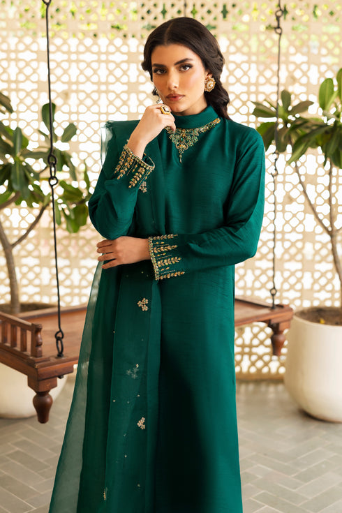 Close-up of NAQSHI Zauq neckline and sleeve cuff highlighting intricate hand‑adda embroidery: kora, dabka, sitara, crystal, botanical motifs on raw silk.