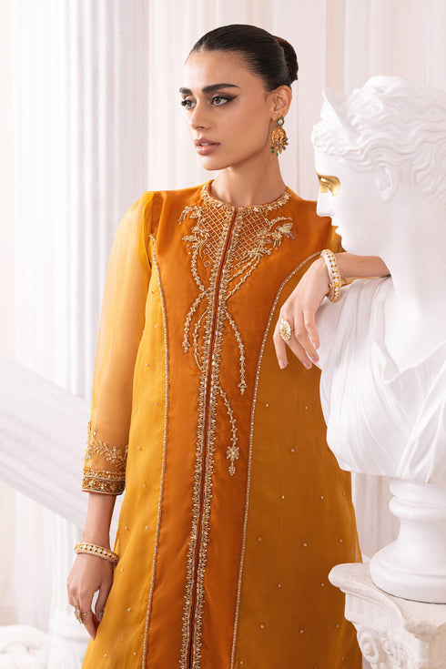 Naqshi Sumbul crushed PK raw‑silk sharara featuring embroidered line-pattern and rich texture complementing the top.
