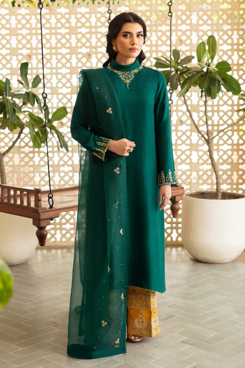 Side profile of NAQSHI Zauq showcasing clean straight-cut silhouette, detailed sleeve embroidery, and contrast mustard culottes with thread and sequin work.