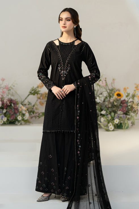 Side profile of NAQSHI Janvi showing fitted embroidered sleeve and A-line silhouette