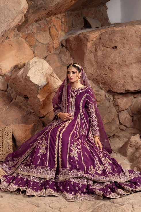 Model wearing full Naqshi Jugnu 3PC set: deep-violet hand‑adda frock with bold back, matching lehenga and ornate sequin dupatta styled for modern bridal glamour.