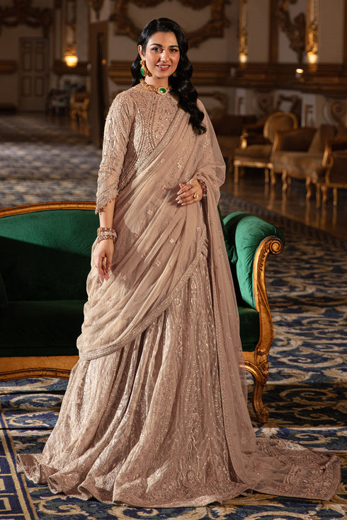 Close-up of Areeza choli bodice detailing dense adda embroidery, sequin work, cut-dana accents and ornate scalloped sleeve motifs.