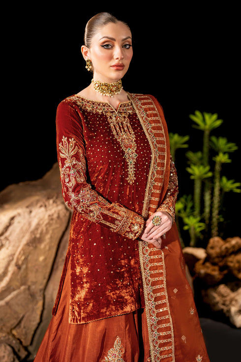 Front styling view of NAQSHI Amber outfit showing boat neckline embroidery and detailed sleeve work