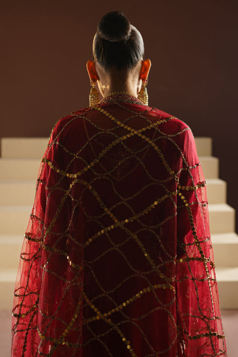 Back view of NAQSHI VANI formal frock displaying net dupatta jaal pattern and long paneled silhouette