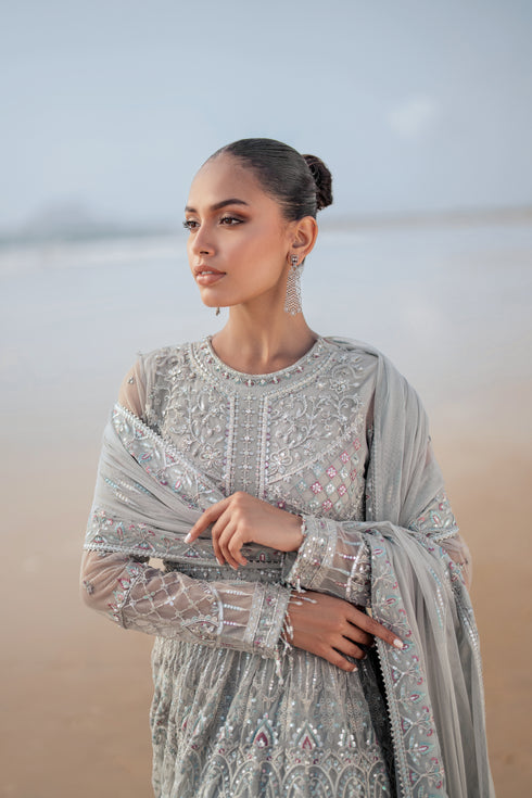 Detailed shot of NAQSHI Valeria sleeve cuff featuring dense embroidery with sequin play, handmade hangings and contrasting floral motif border trim.