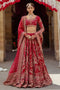 NAQSHI Qurbat fuchsia red bridal raw-silk lehenga front view with round embroidered neckline, scalloped three-quarter sleeves, richly hand-adda embellished choli, and layered lehenga.