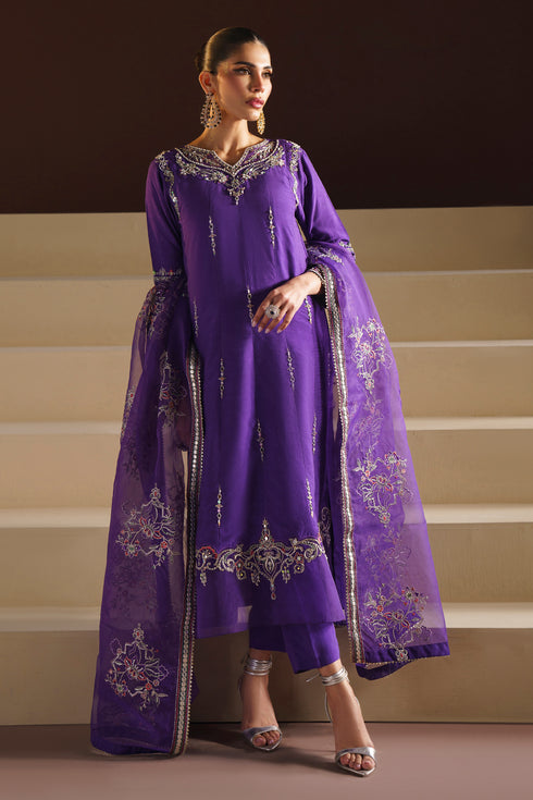 Close-up showing Wafiya sleeve cuff with hand‑adda motifs, sequin highlights and neat stitching on organza.