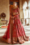 NAQSHI Shahana crimson‑red raw-silk lehenga choli with round neckline, scalloped three-quarter sleeves, heavily adorned with hand-adda embroidery including naqshi, dabka, sitari, cut dana, stonework, crystals, paired with matching dupatta and potli clutch.