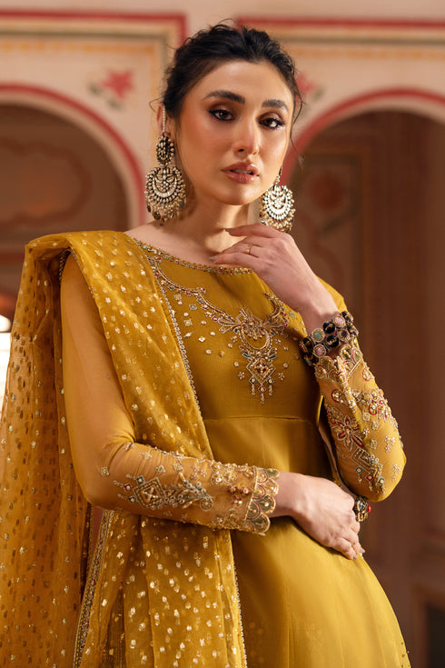 Close-up of sleeve detail featuring fitted sleeve with intricate embroidery and sequins.