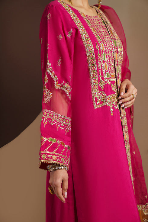 Mid body detail shot of ZUHI long shirt displaying heavy front panel embroidery and neat stitching