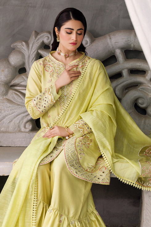 Three quarter pose showing Sophie pistachio sharara suit dupatta drape and overall styling