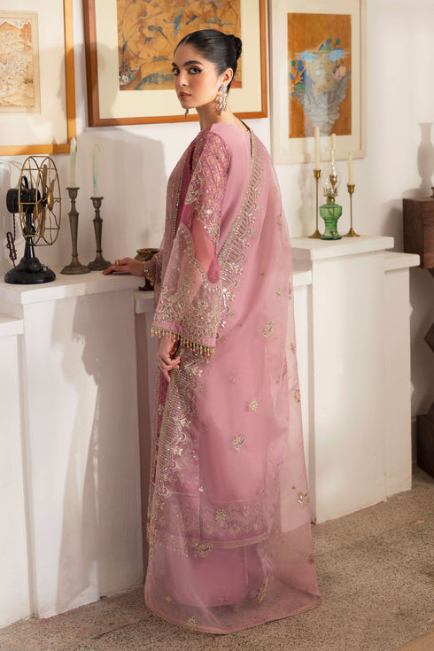 Back view of NAQSHI Nayab organza shirt featuring embroidered chunky hem border, crystal hangings on back yoke, and straight culottes peeking.