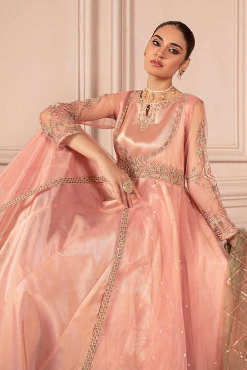 Seated pose of NAQSHI Amella outfit showing frock flare and sequin embroidered net dupatta detail