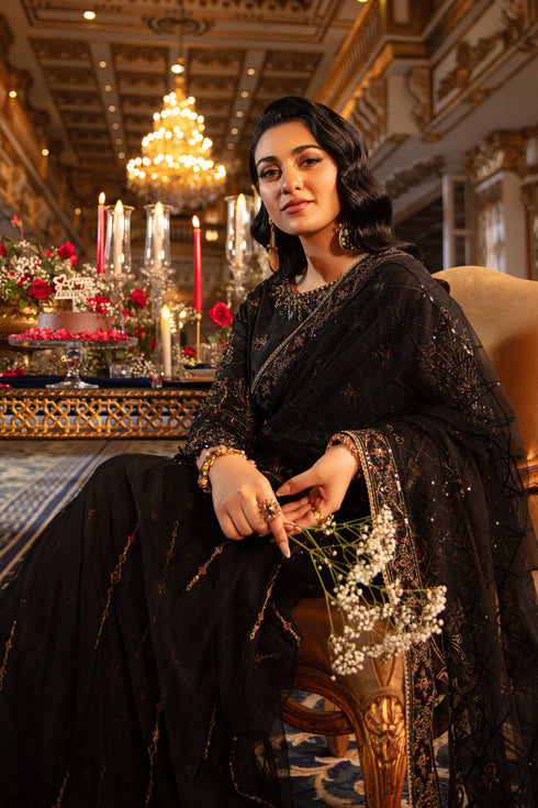 Macro capturing the texture of Hainoor’s net saree fabric alongside the blouse’s bead-sequin hangings and cutwork embroidery.