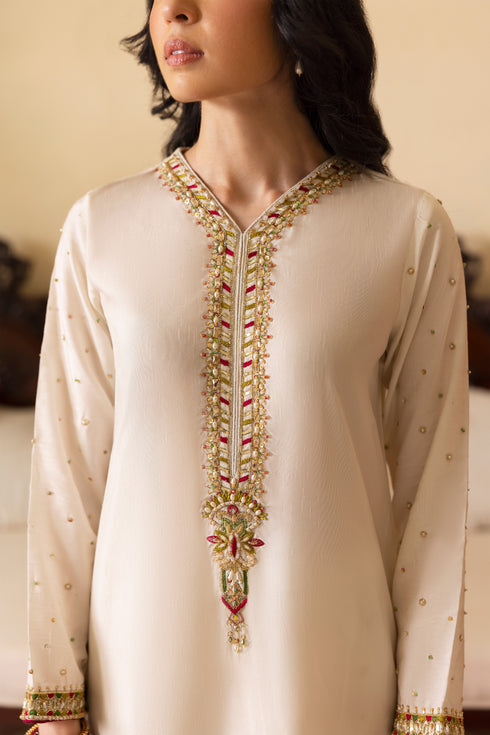 NAQSHI Abish culottes front view with multi-tone sequin motif spray on raw silk and embroidered border with threadwork complementing shirt detailing.