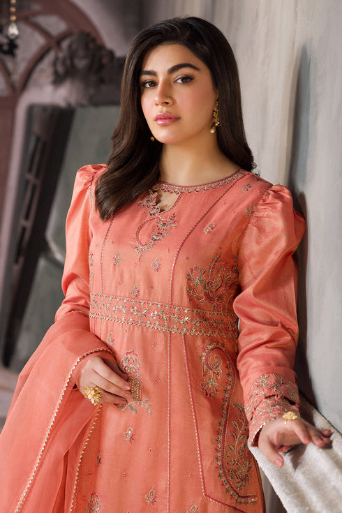 Portrait view highlighting boat neckline with keyhole and embroidery detail