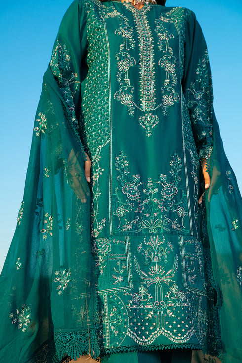 Detailed close up of front shirt embroidery pattern and sleeve trims on zinc ready to wear women 3 piece suit