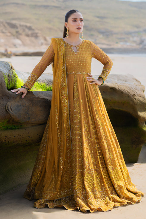 NAQSHI Ainara mustard crinkle frock front featuring round neckline with keyhole, heavily hand‑adda embellished bodice and sleeves, straight cutline over plain pants.
