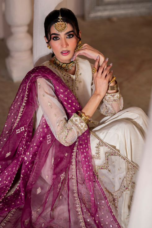 NAQSHI Abeeha outfit styled with magenta dupatta draped over shoulder, showing embroidery, sequin details, and contrast accents