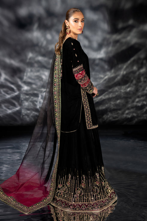 Full front standing view of NAQSHI Adhan outfit showing black velvet shirt, paneled sharara, and detailed embroidery