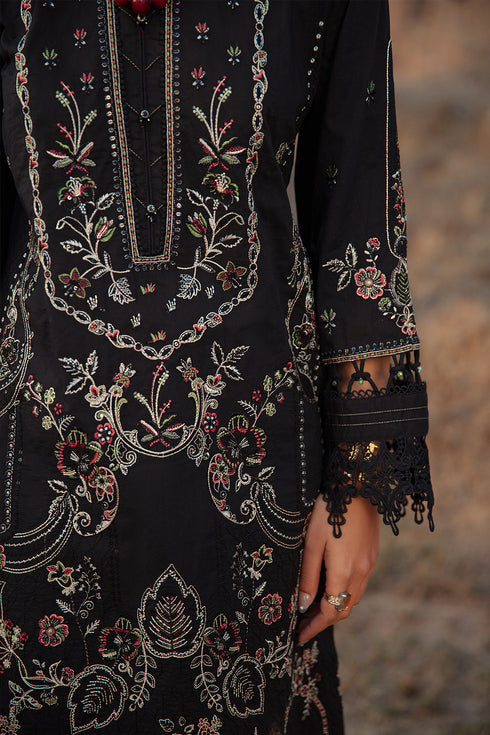 Detailed close up of heavy embroidery pattern and sequins work on black lawn shirt ready to wear formal dress
